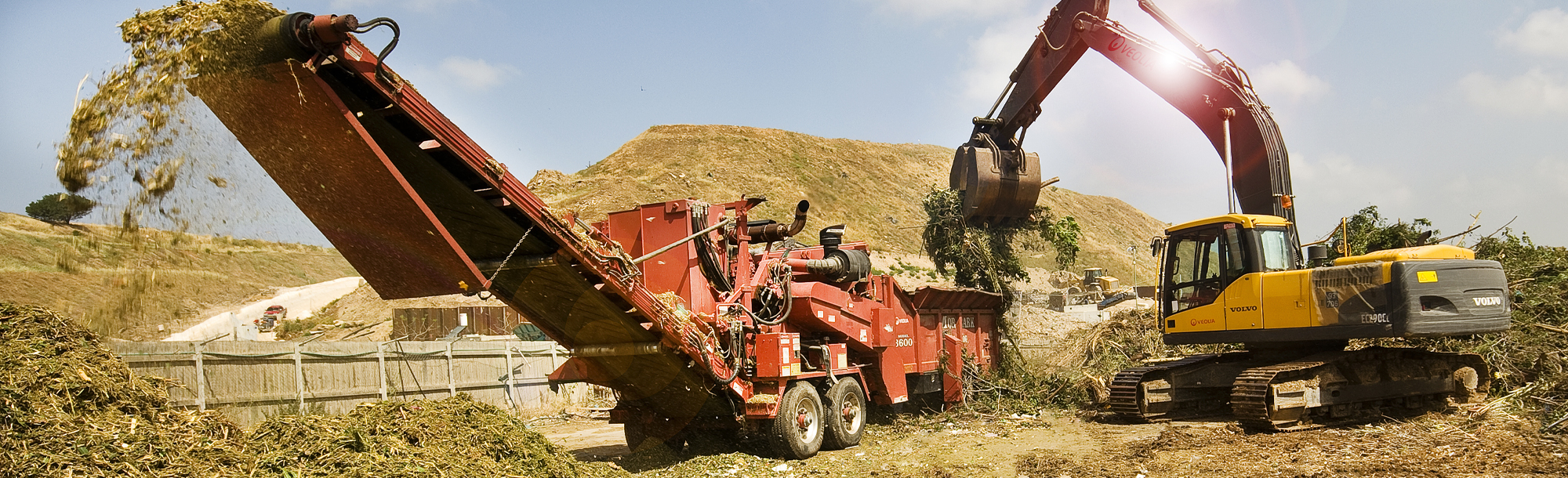 Tel Aviv, Israel, May 20 2012: Special equipment machine with crane granulate crush tree branches wood. Natural bio fuel biomass production 